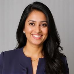 Professional headshot of Anjali Sharma, Lead Stylist